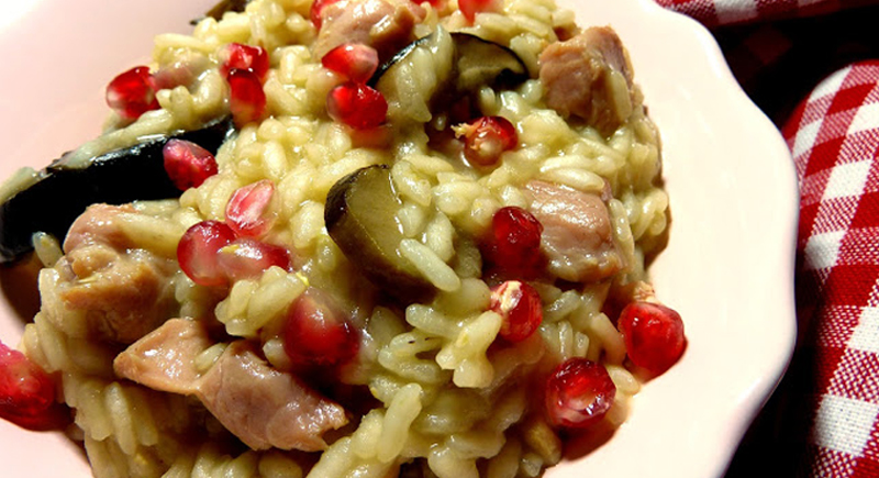 Risotto con funghi crema e melagrana