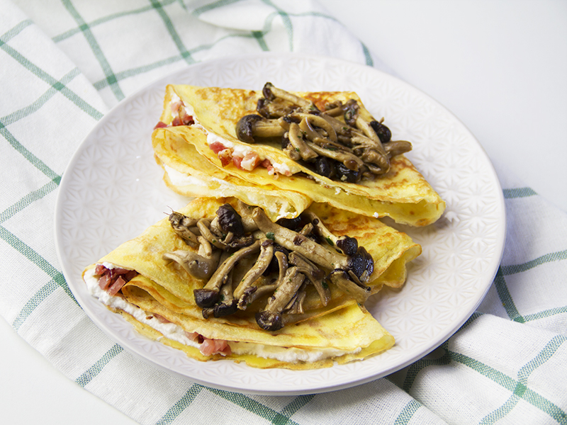 Crespelle ai funghi con speck e ricotta